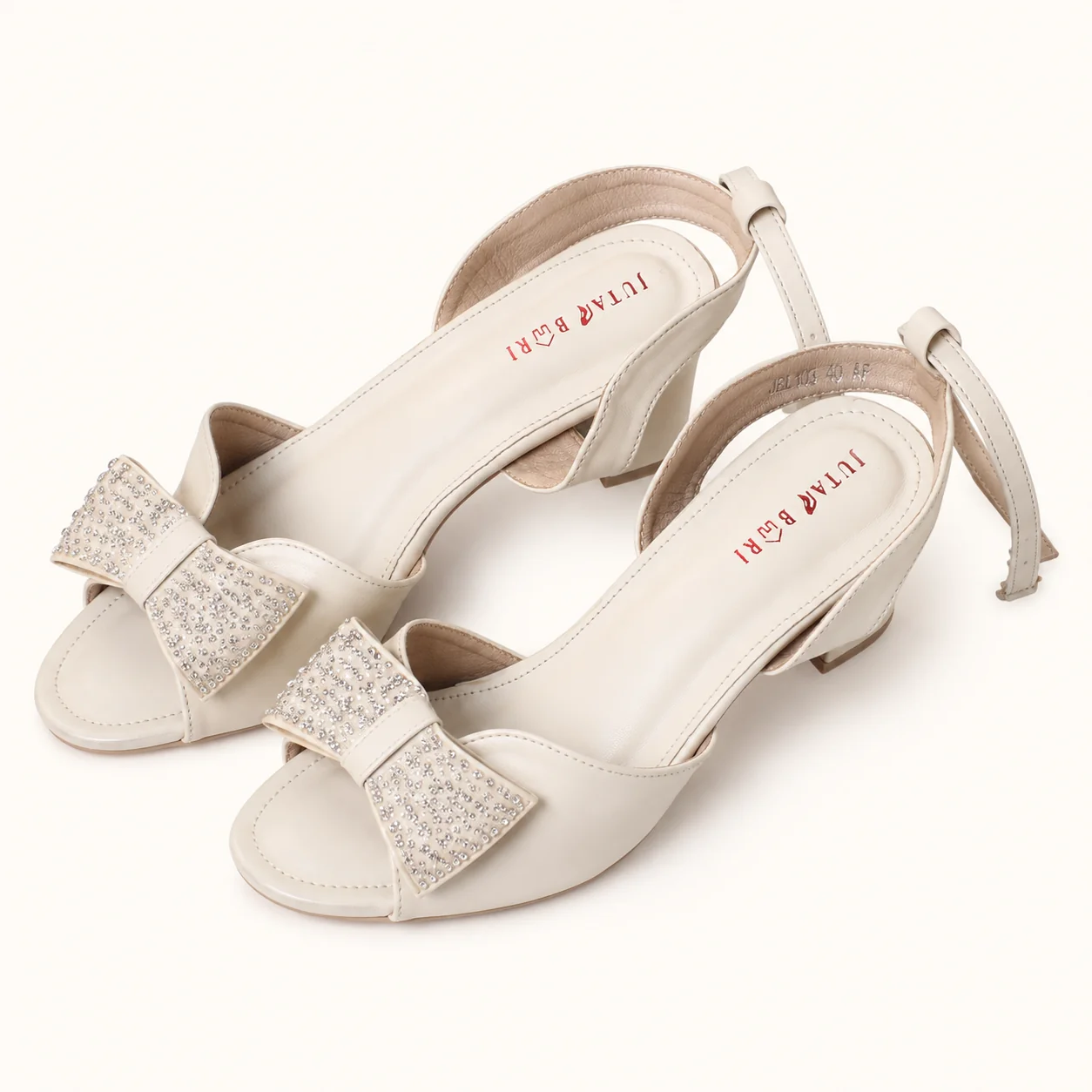 HEELS WITH CRYSTAL BOW